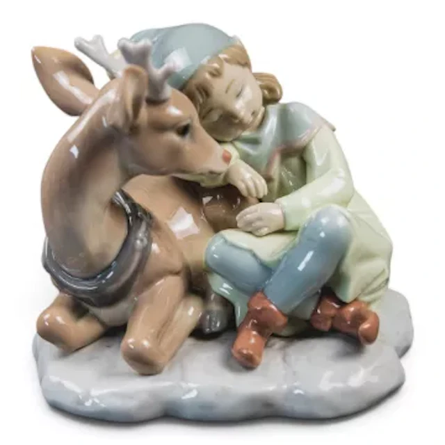 A Lladro figure 'Well Earned Rest, model 6897, from the Santa's Magical
