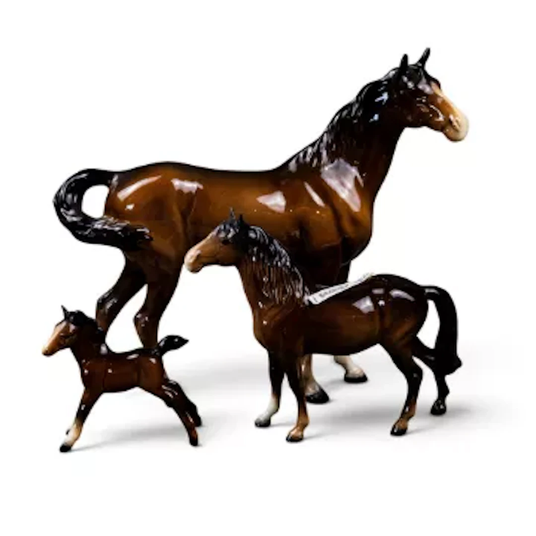 A group of three Beswick horse models in brown gloss, to include Swish