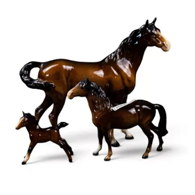 A group of three Beswick horse models in brown gloss, to include Swish