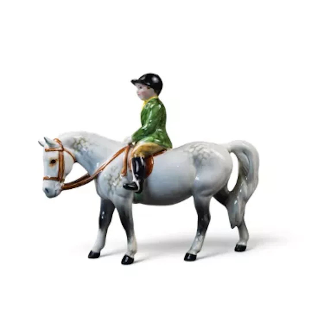 Beswick rare model of boy in green jacket on grey pony, model 1500, h.14cm.