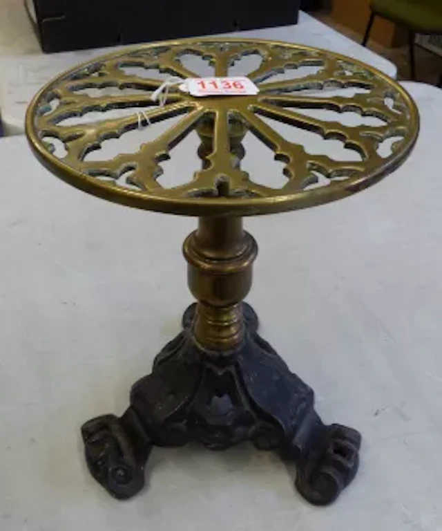 Fireside brass and cast iron trivet, height 29cm, diameter 22cm, together