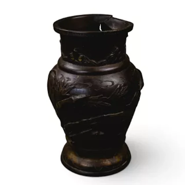 A Japanese bronze vase, likely from the Meiji period, decorated in