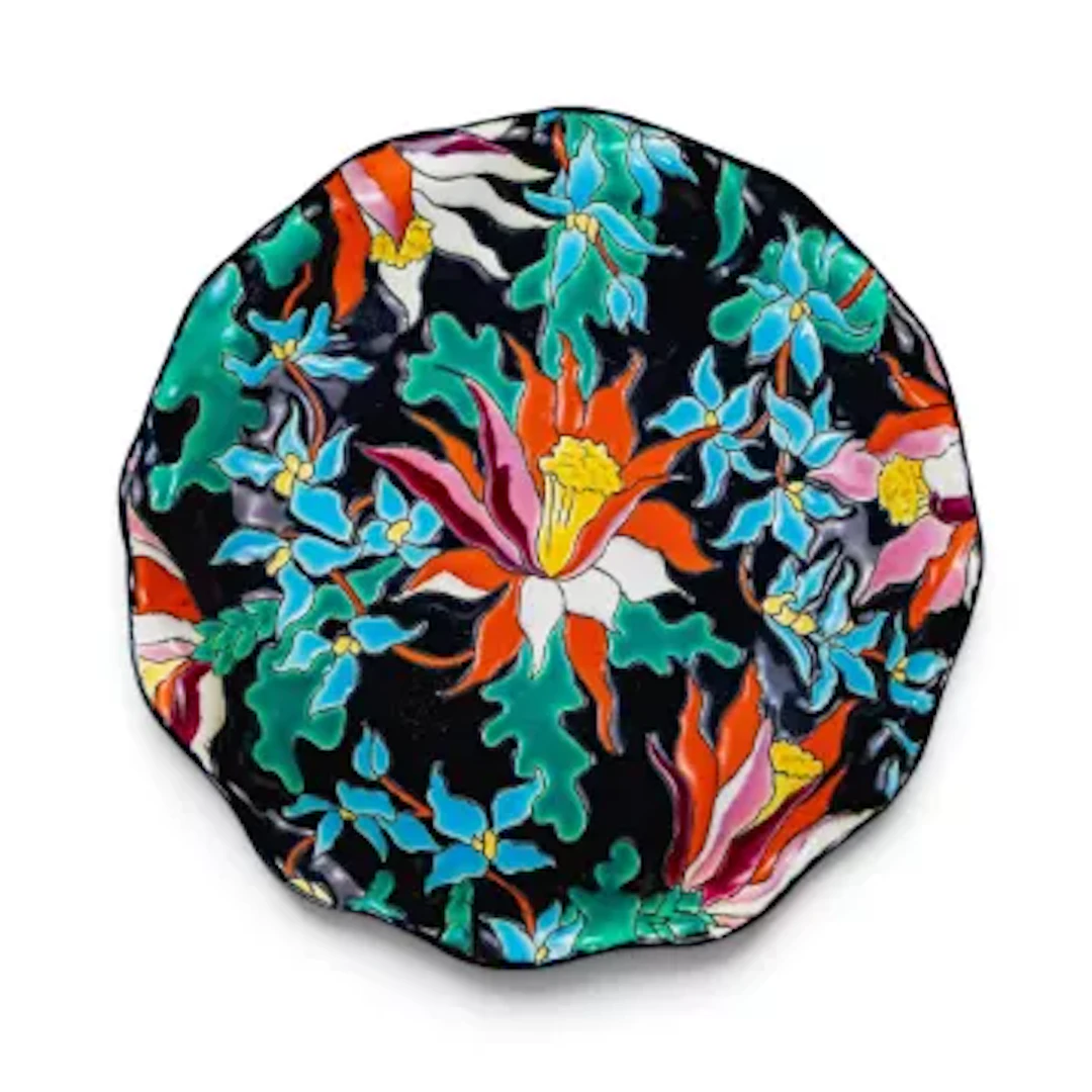 A French Art pottery fluted rim bowl by Emaux de Longwy, decorated