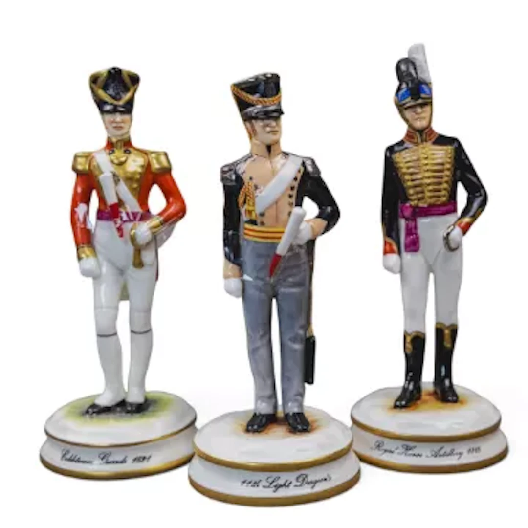 Three Michael Sutty porcelain military figures to include 11th Light