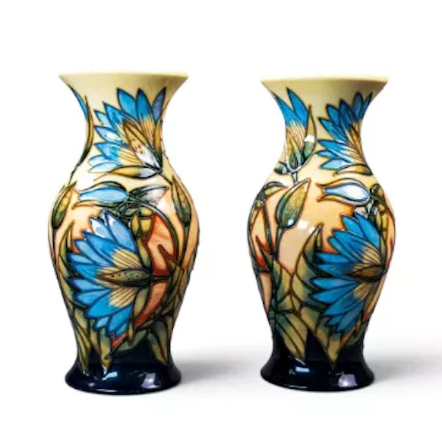 A pair of Moorcroft limited edition vases in the Samarkand Lily design