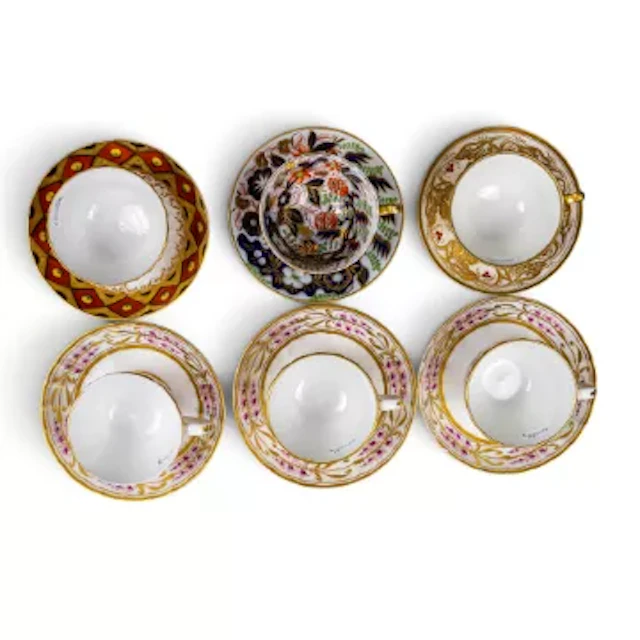 A group of six 19th century English porcelain cups & saucers, in various