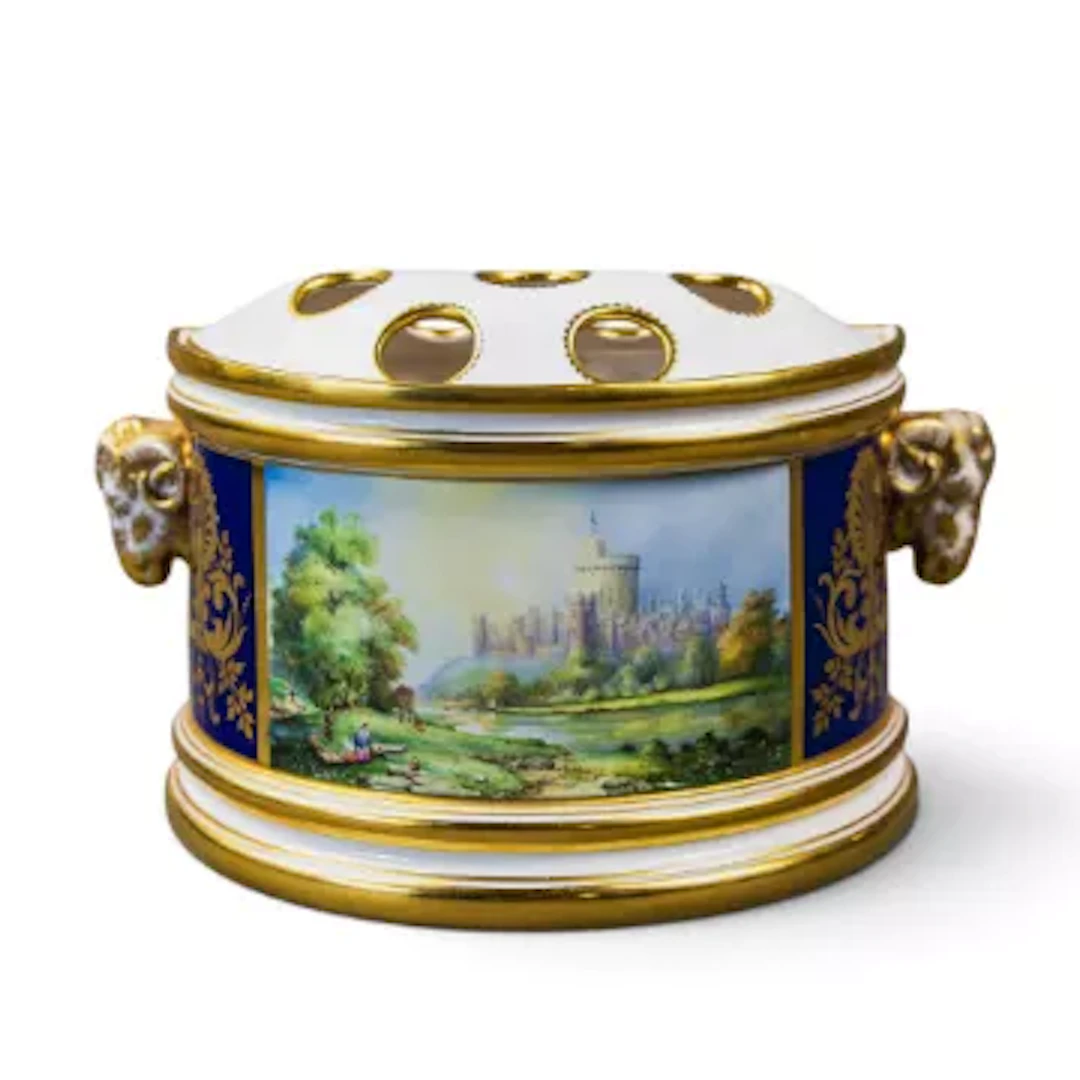 A Lynton porcelain bough pot with frog insert and sheep head handles