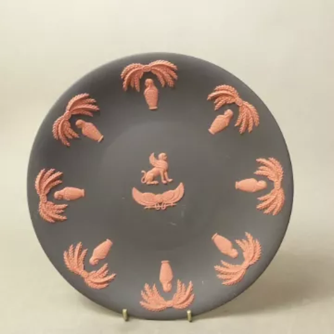 Wedgwood terracotta on black jasper ware Egyptian themed plate, diameter 22cm.