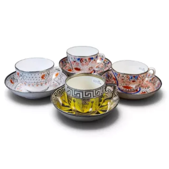 A group of four 19th century English porcelain cups & saucers, with