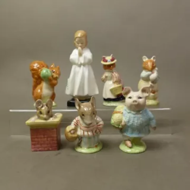 Four Royal Albert Beatrix Potter figures, Squirrel Nutkin, Mrs Tittlemouse