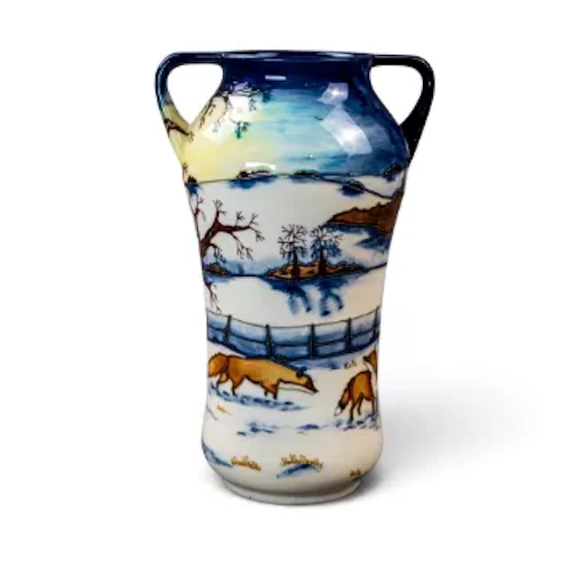 A Moorcroft two handled vase in the Woodside Farm design by Anji Davenport