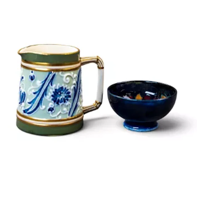 A miniature Moorcroft bowl in the Pomegranate design by William Moorcroft