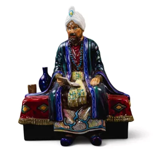 A studio pottery figure of 'Omar Khayyam' by Reg Johnson, former Royal