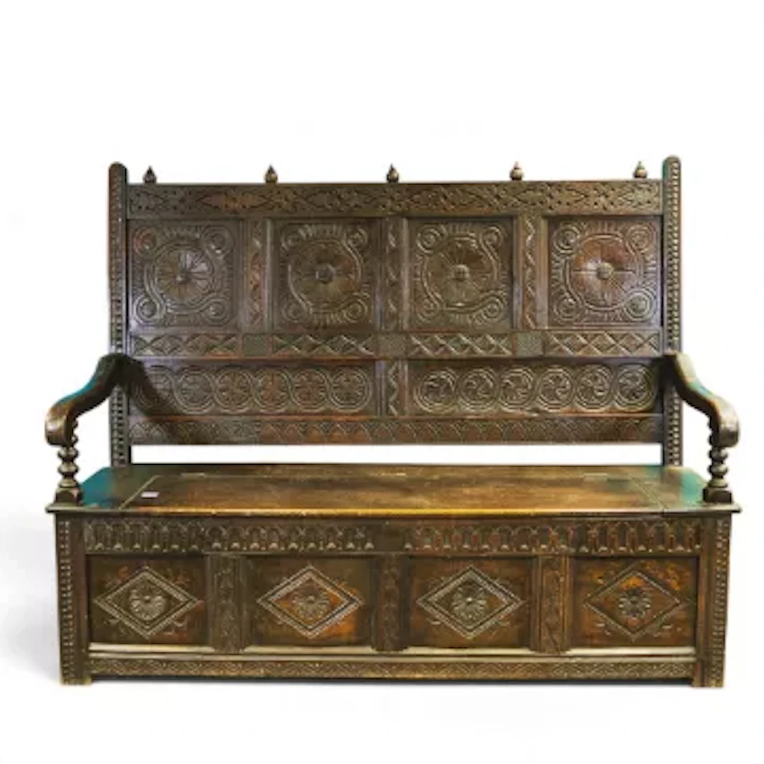 19th century large carved dark oak four panelled hall bench, with