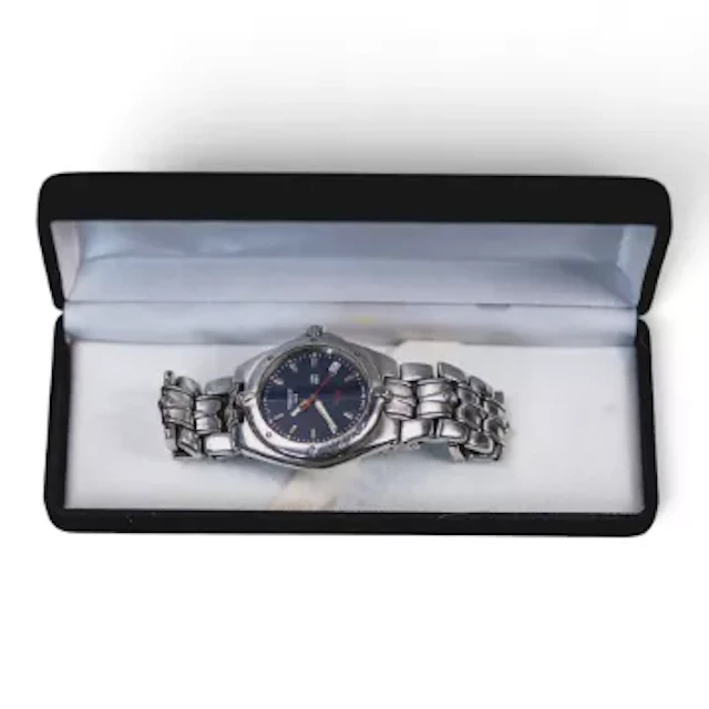 TISSOT gents S/S divers watch & bracelet with date, measures 35mm
