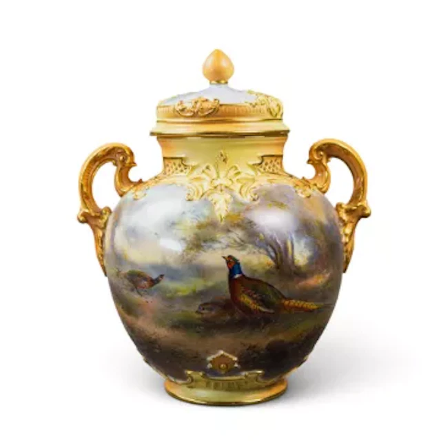 A bulbous Royal Worcester vase & cover, with ornate twin handles and