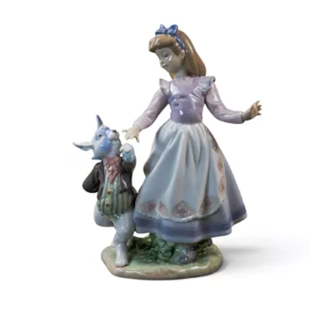 A Lladro figure 'Alice in Wonderland' model no.5740, h.22cm.