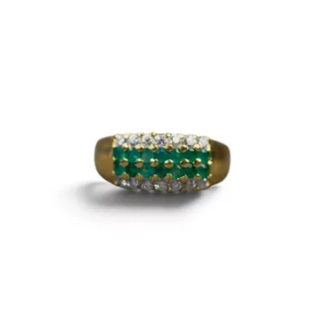 18ct gold cluster ring, featuring two rows of round emeralds bordered