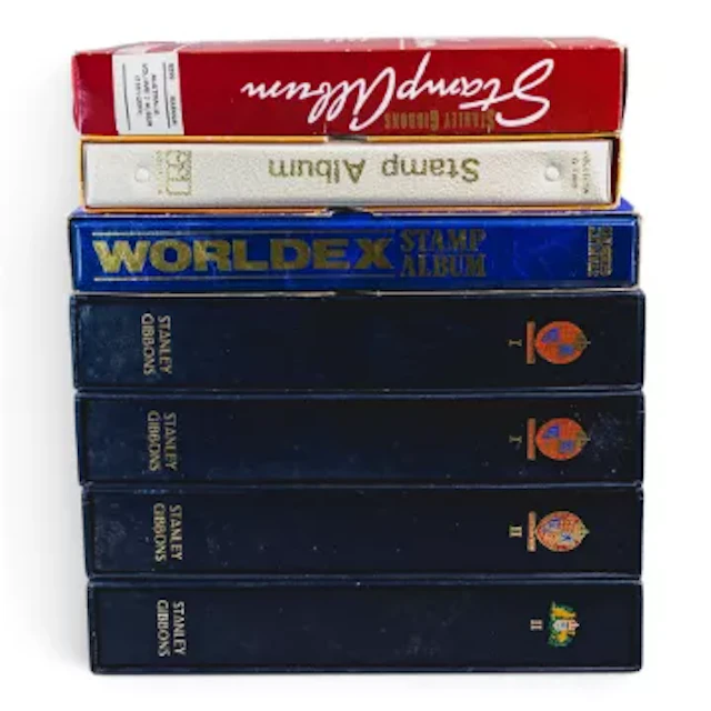7 albums of British Commonwealth & foreign stamps and odd 5 x UK banknotes
