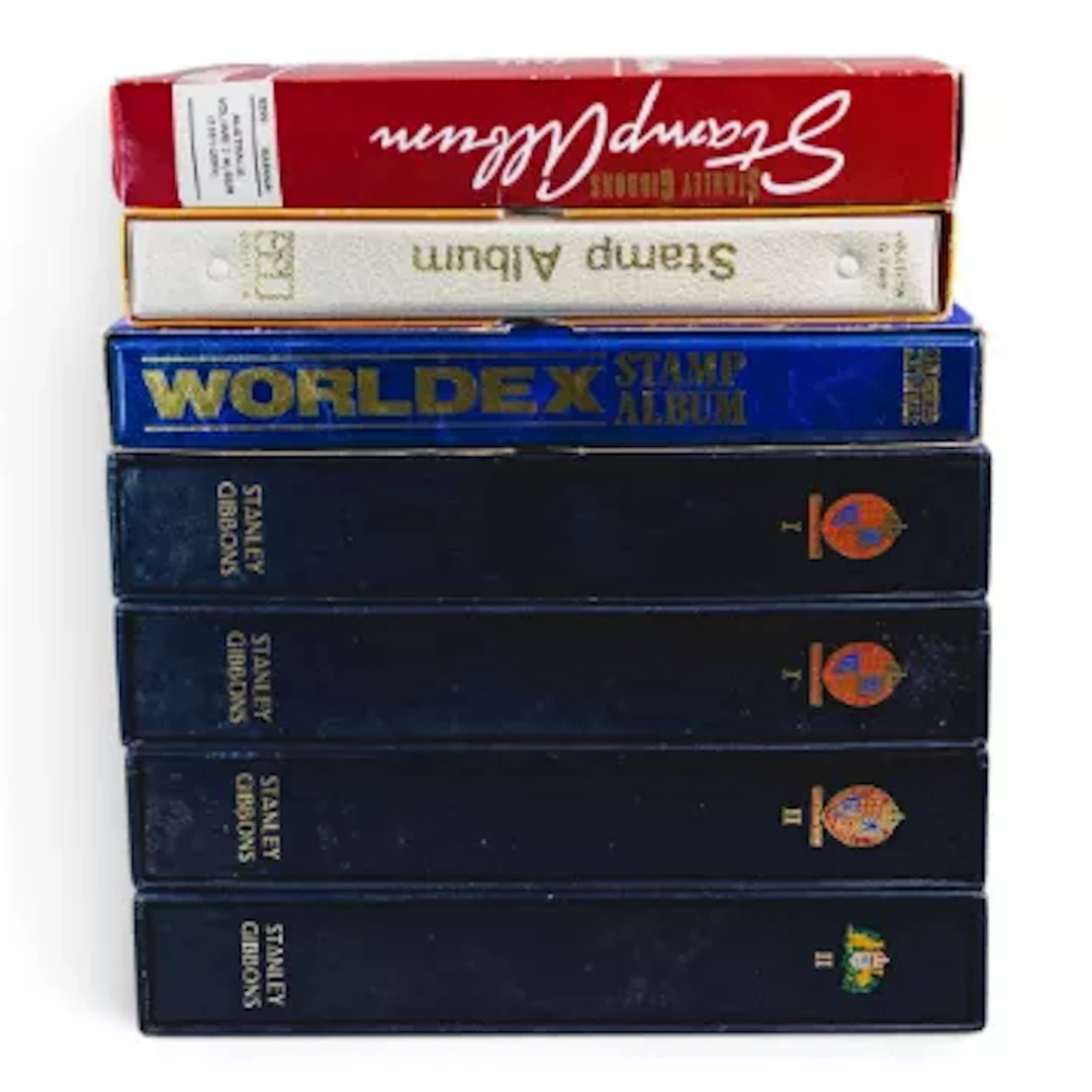 7 albums of British Commonwealth & foreign stamps and odd 5 x UK banknotes