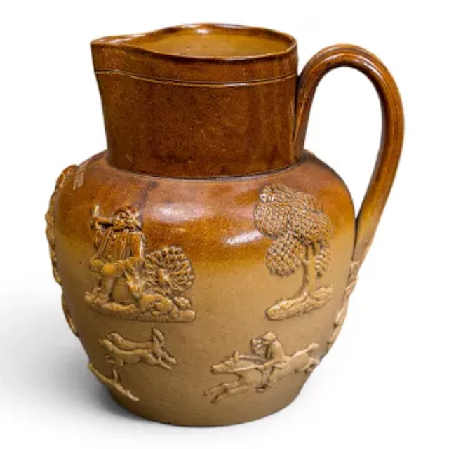 Doulton Lambeth salt glaze jug, "Tommy Toss Pot" decorated with embossed