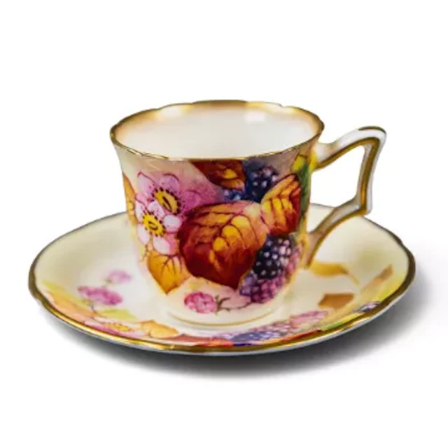A Royal Worcester small cup & saucer decorated with fruit, signed
