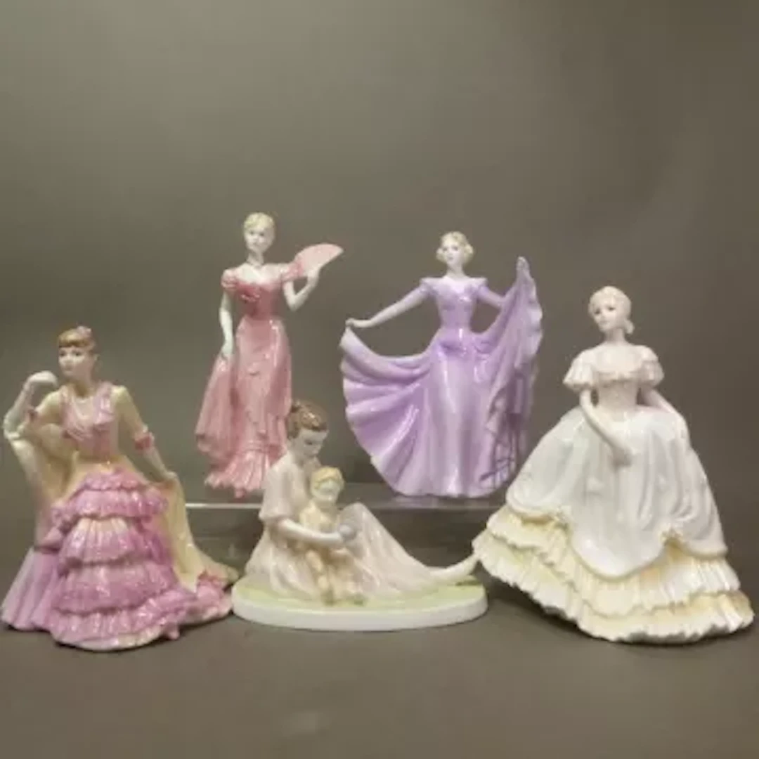 Five un-named Coalport lady figurines, tallest 22cm (5).