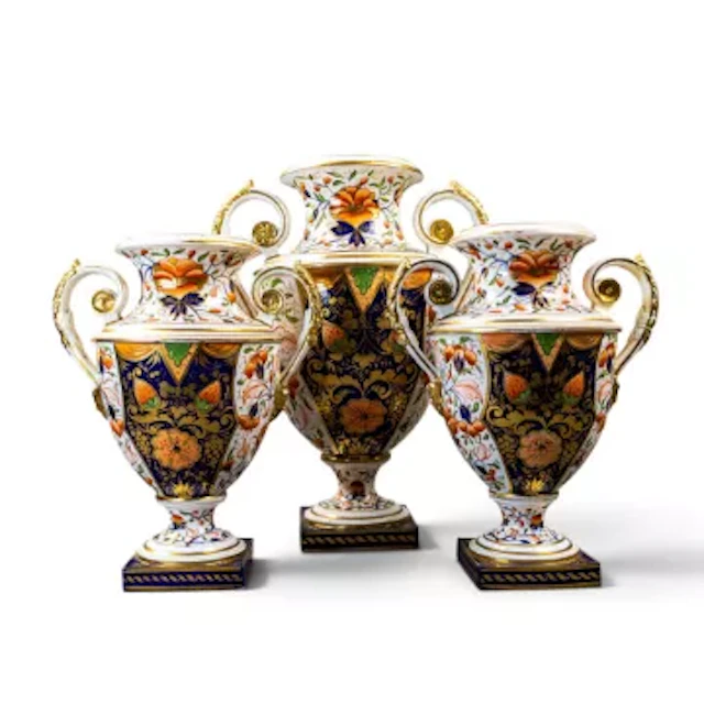 A garniture of Derby Porcelain Vases (1820/1830cc) featuring classical