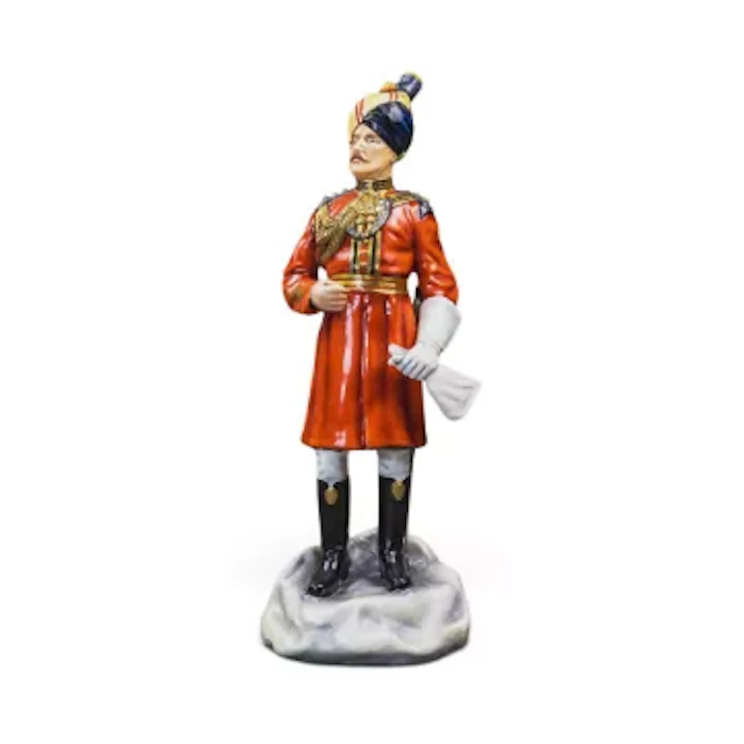 A Michael Sutty porcelain military figure, Governor's Bodyguard Madras, h.29cm