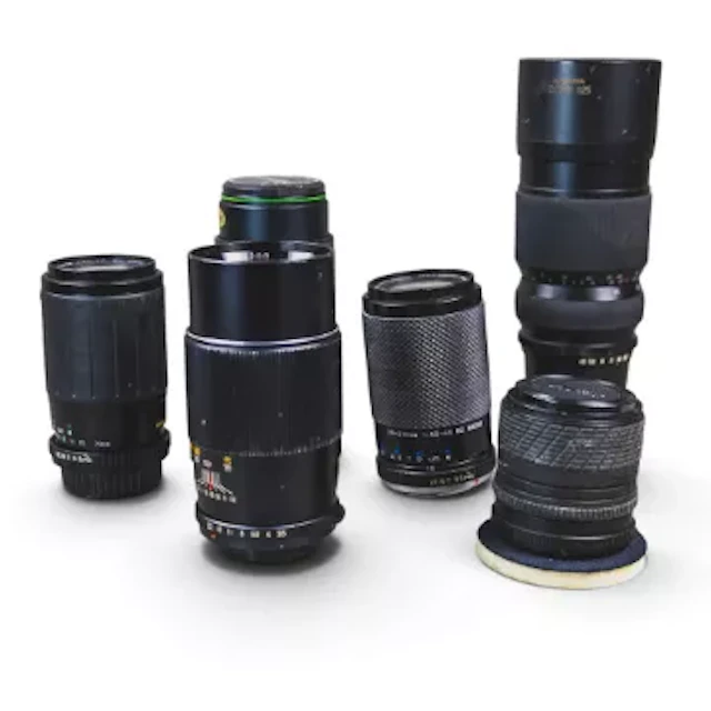 A collection of telephoto lenses to include Komura Zoom 925 90-250mm
