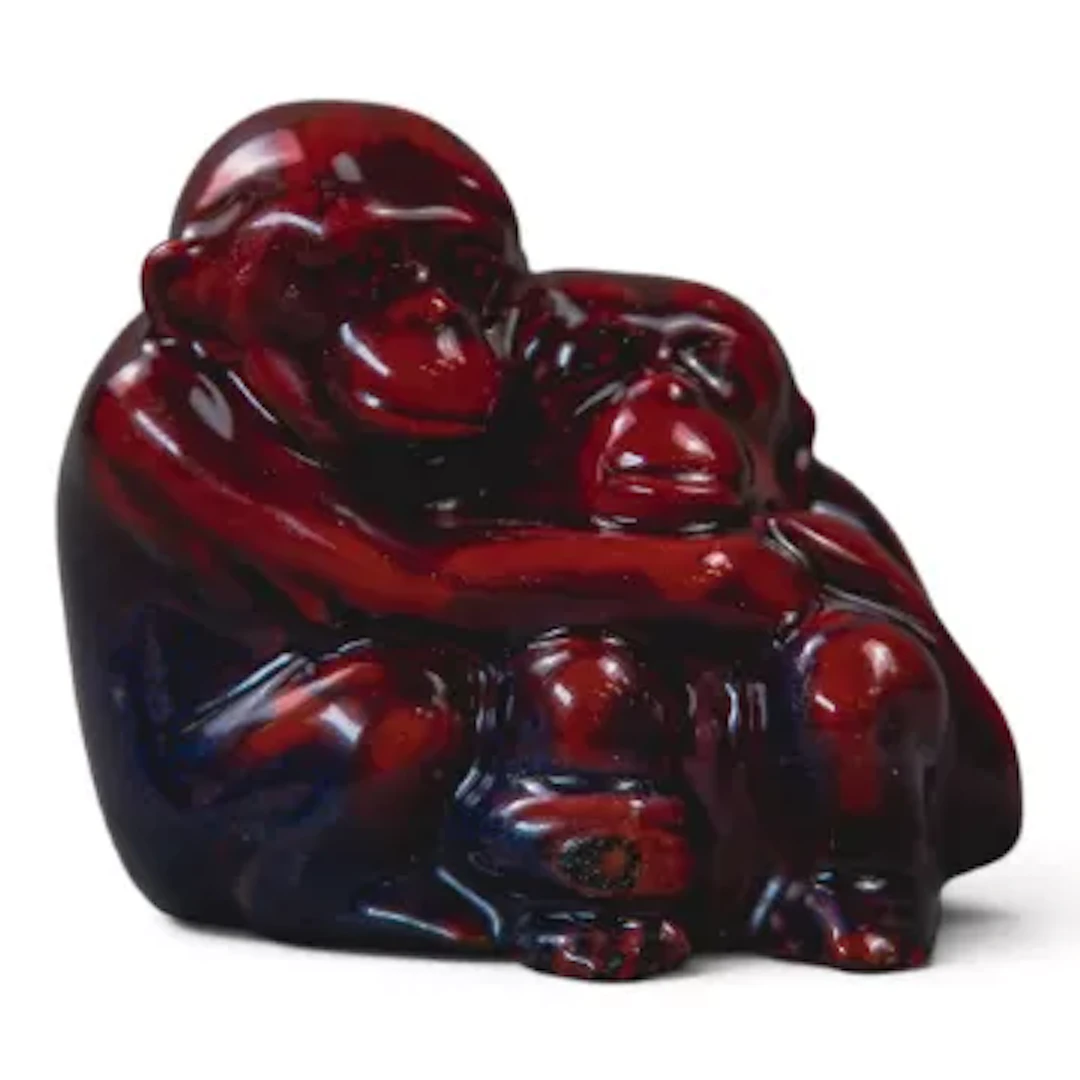 Royal Doulton pair of monkeys cuddling, in rare Sung glazes, C1920, h.7cm.