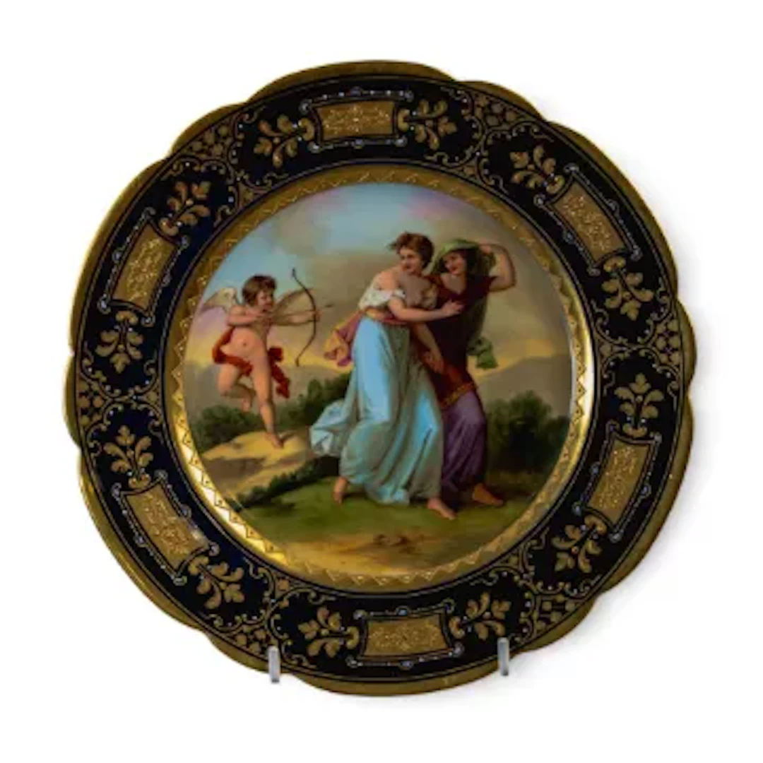 A Royal Vienna plate 'Amour Rachi', featuring a cherub and two females
