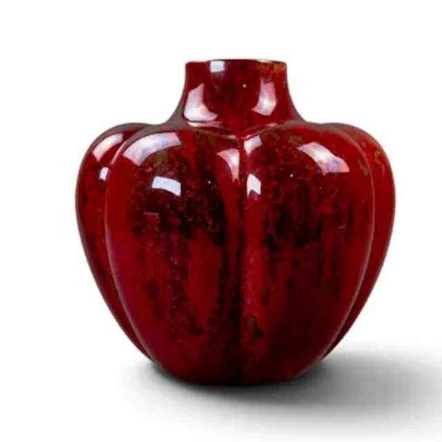 A Royal Doulton Flambe pumpkin vase, c1915, by Charles Noke, h.21cm.