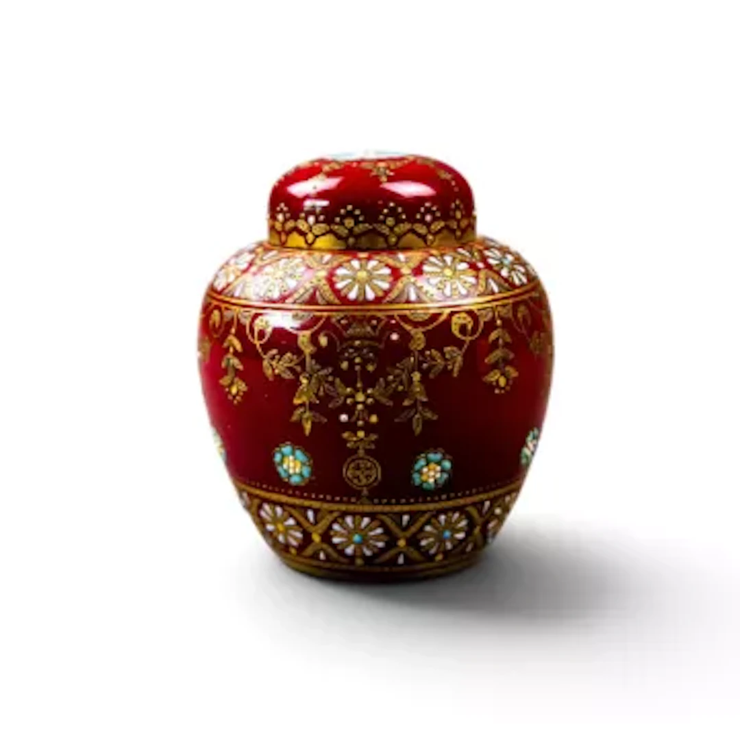 A 19th Century Coalport jar & cover with jewelled decoration and ornate