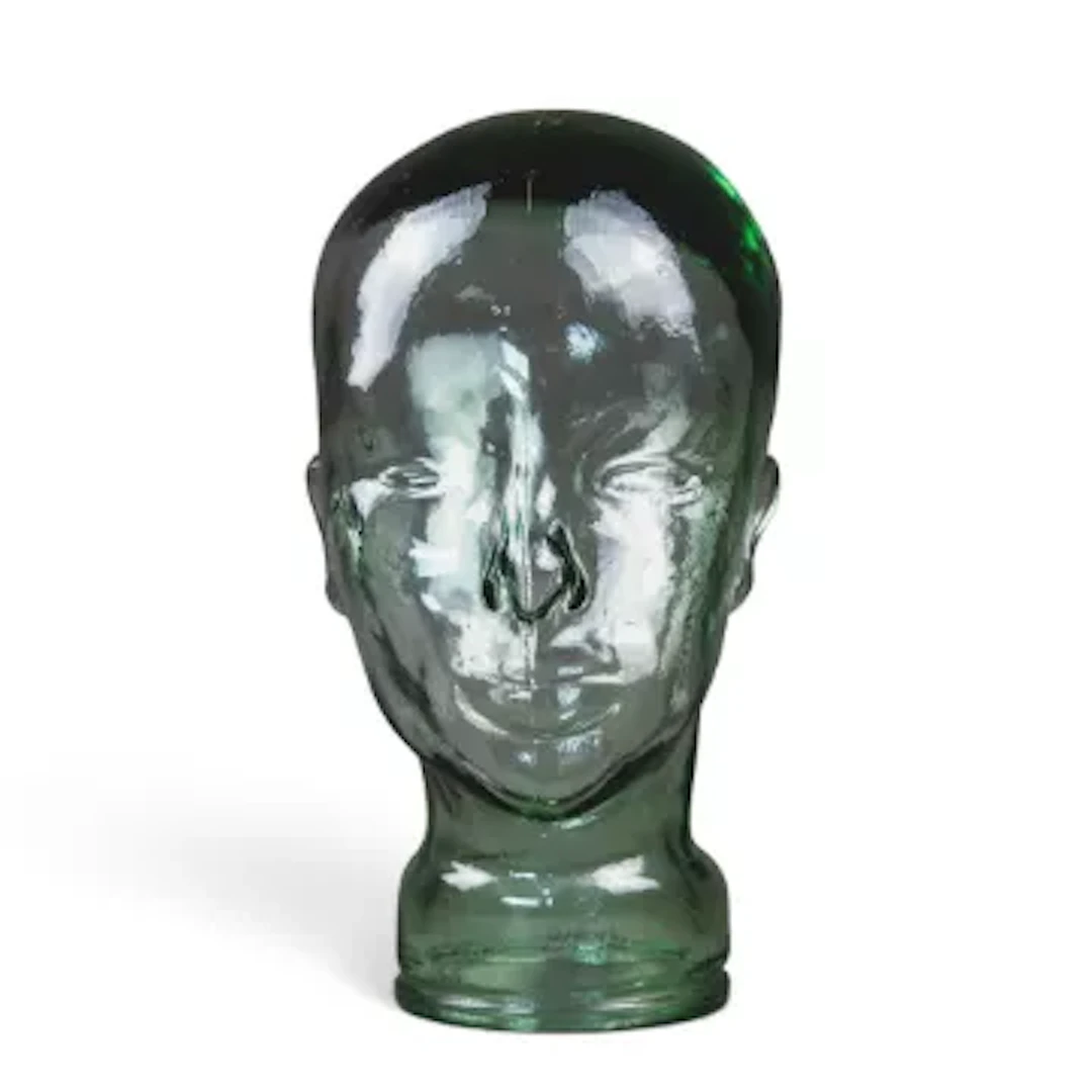 A clear glass male form mannequin style head study. (H.28.5cm x W.16cm)