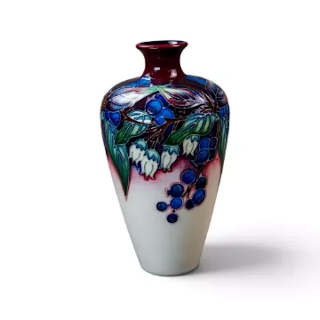 A Moorcroft vase in the Blueberry design by Nicola Slaney, made for