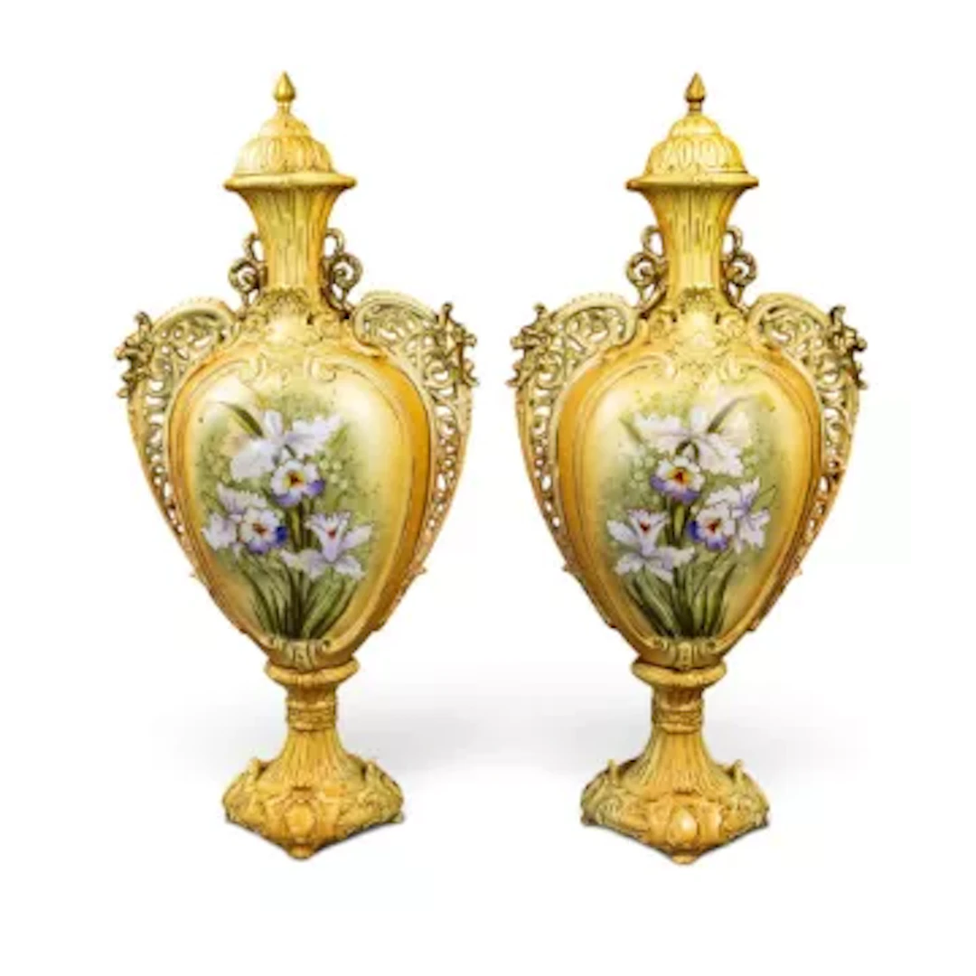 A large pair of Continental urn shaped vases with covers, both decorated