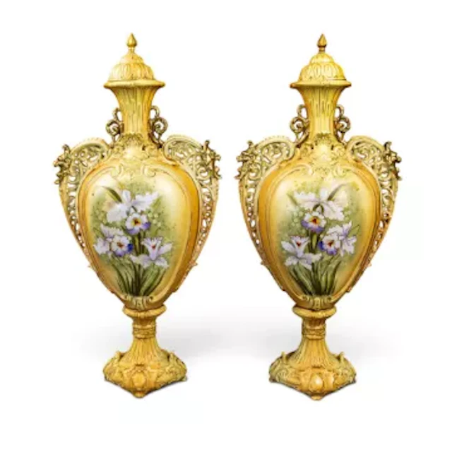 A large pair of Continental urn shaped vases with covers, both decorated