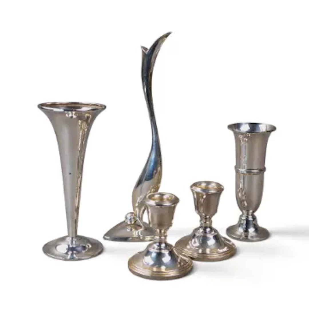 5 x items of silver - a pair of candlesticks & three vases, the tallest