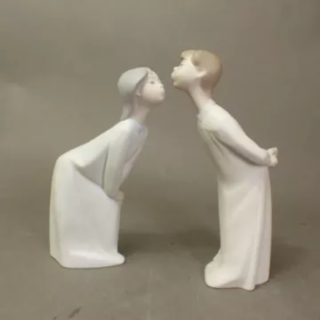 Two Lladro figures, Kissing Goodnight girl and boy, models 4873 and