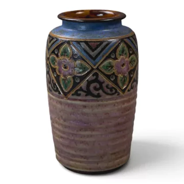 A Royal Doulton stoneware vase c 1920, with an incised floral design