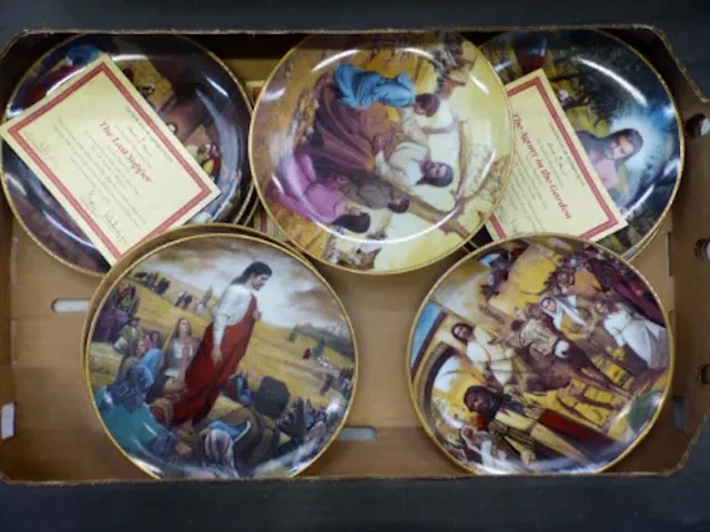 A group of eight Danbury Mint religious themed decorative wall plates
