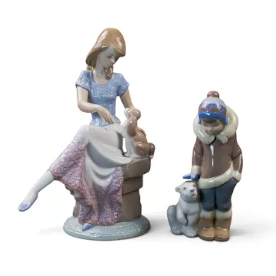 Two Lladro figures to include 'Eskimo Boy with Polar Bear', model