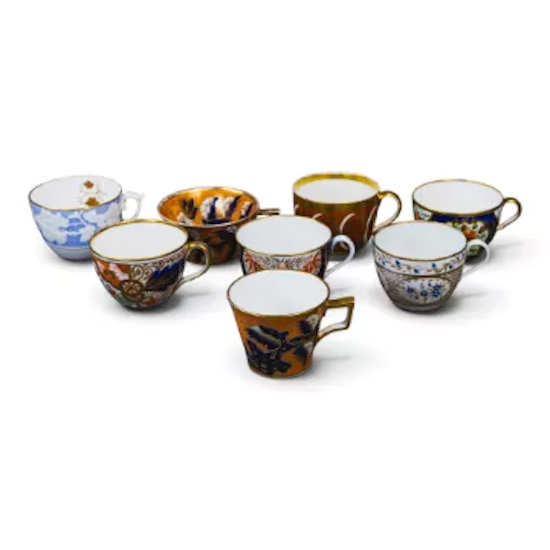 A group of 8 English porcelain 19th century tea cups by various manufacturers