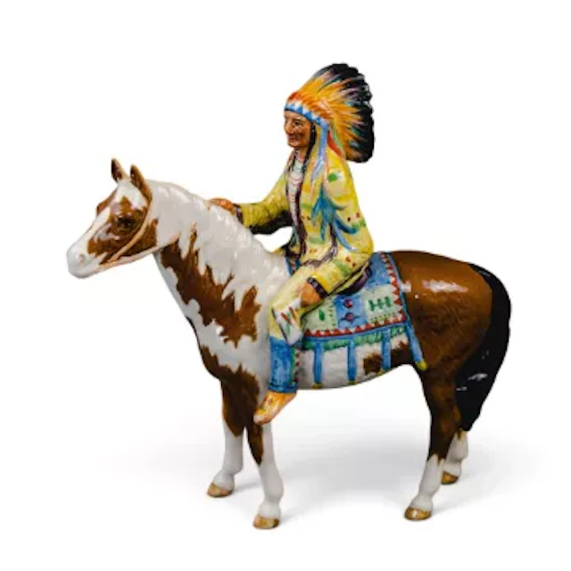 A Beswick Mounted Indian Chief, model 1391, with yellow clothing as