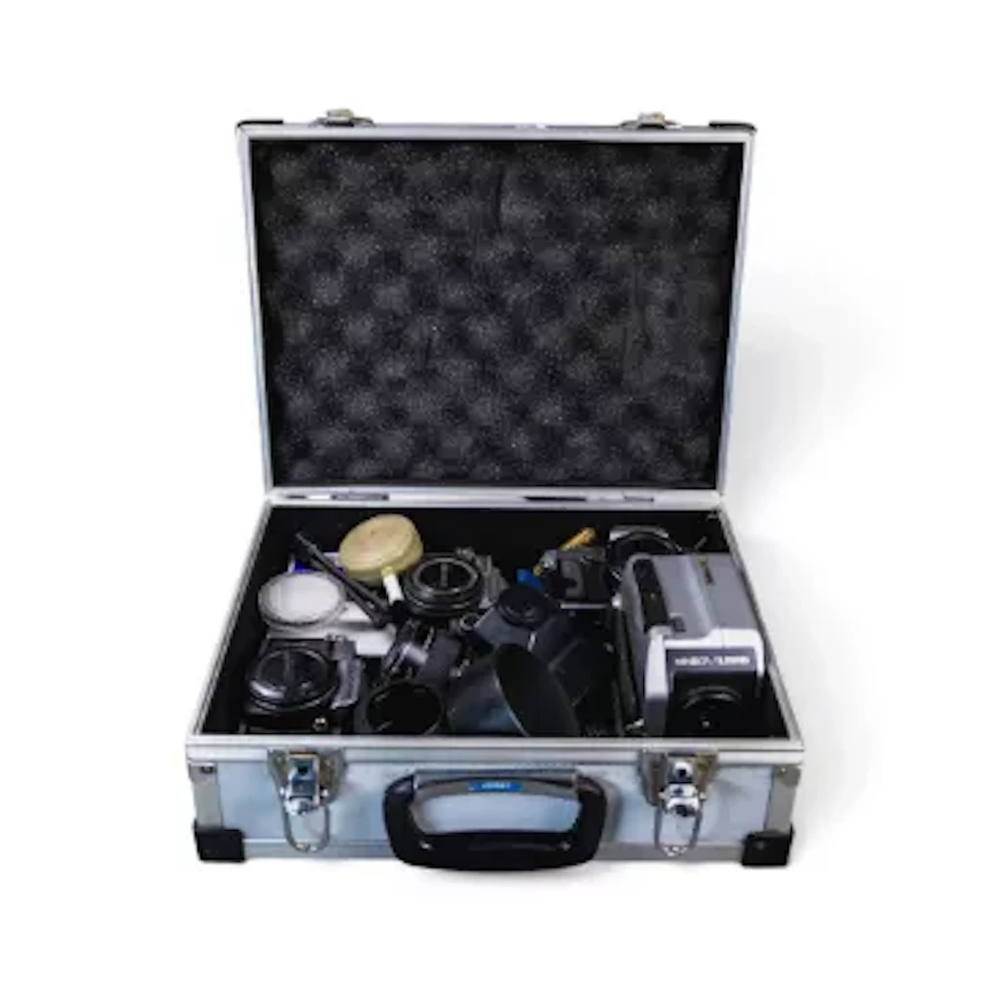 A collection of 35mm SLR film cameras and accessories to include Olympus