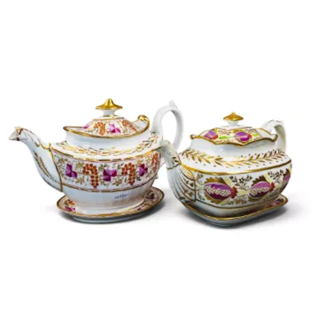 A group of 2 English porcelain 19th century teapots and stands by