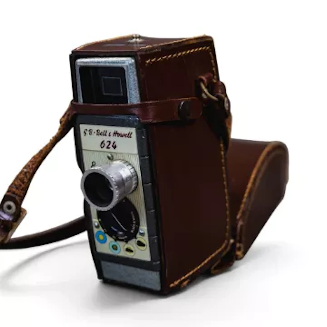 G B Bell & Howell 624 8mm film camera and lens in original case.
