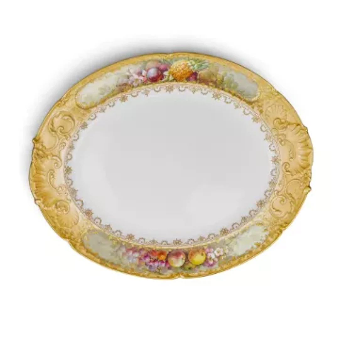A late 19th Century Doulton Burslem oval plate with an ornately decorated