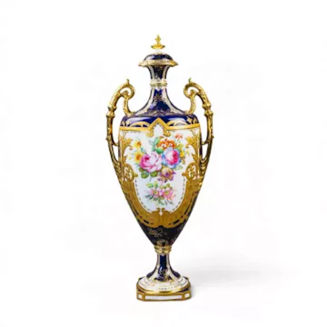 A large Royal Crown Derby 2 handled urn vase, decorated with floral